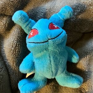 Cuddly Blue Monster Plush with Red Eyes